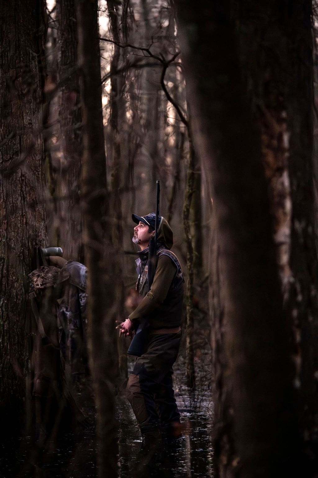 Hunters in a flooded forest
