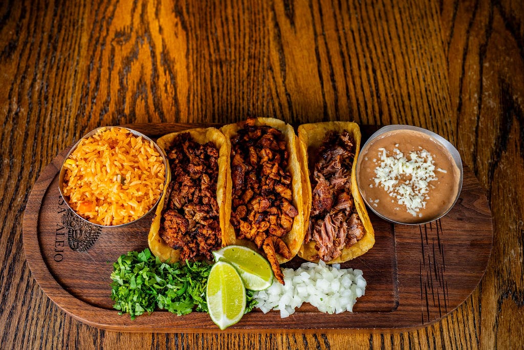 Tacos with rice and beans platter