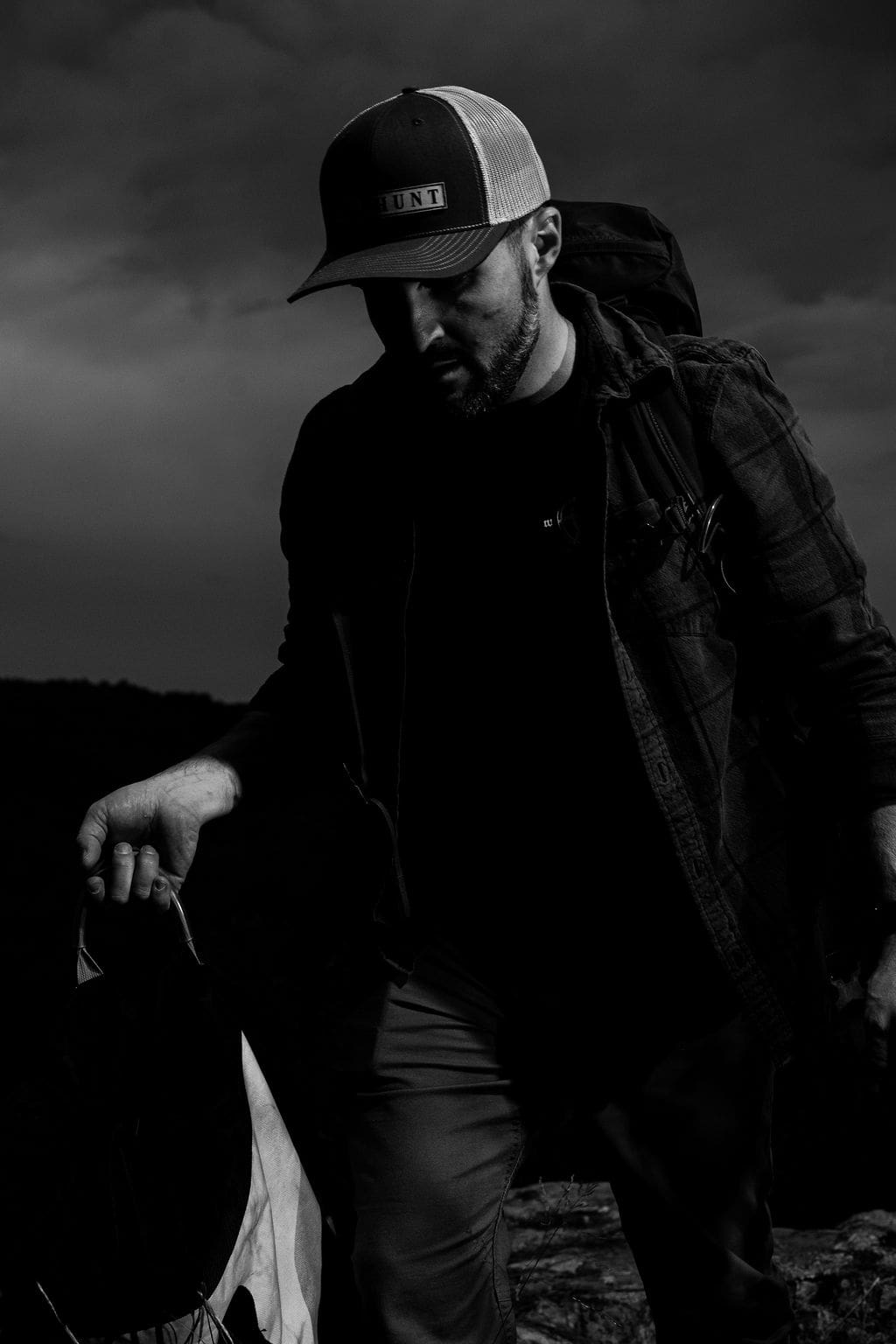 Person hiking in black and white.